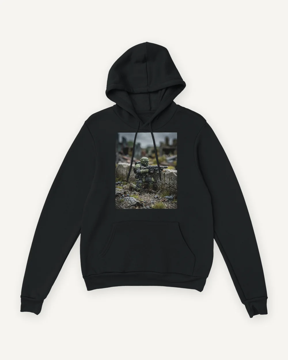 Black hoodie printed on the front with a painted soldier miniature in ruins